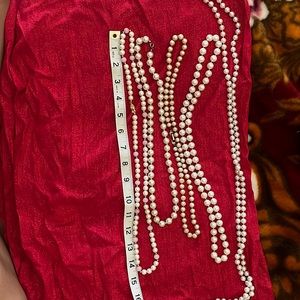 Vintage Faux pearl necklaces. Average size 15” plus one extra long strand.